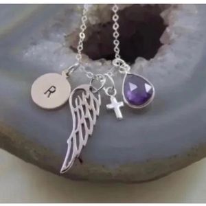 Handmade silver charm angel wing necklace